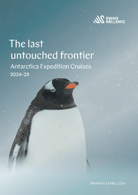 The cover of Antarctica 2024 2025 catalog for Swan Hellenic cultural expedition cruises, depicting a penguin in the snow